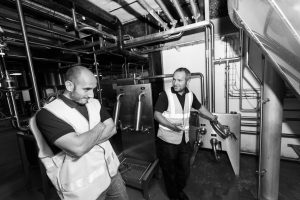 Northern Whisper and Moorhouse's Brewery Collaboration Beer - Dan Casru our head brewer showing Northern Whisper Brewer the Tanks.