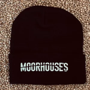 Moorhouse's branded black beanie hat, with the Moorhouse's logo in white embroidered on the front.