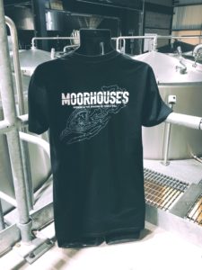 Back of Moorhouse's Black Short Sleeve T-Shirt with Moorhouse's logo large across the back and a graphic outline of Pendle Hill.